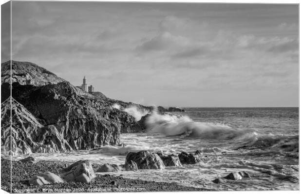 Mumbles lighthouse from Bracelet bay, black and white Canvas Print by Bryn Morgan