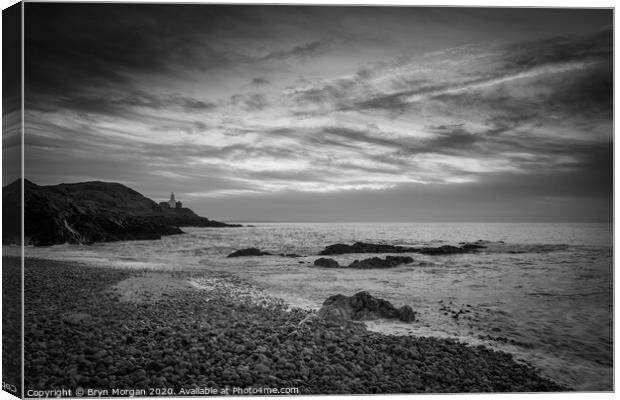 Mumbles lighthouse from Bracelet bay, black and white Canvas Print by Bryn Morgan