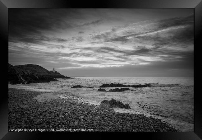 Mumbles lighthouse from Bracelet bay, black and white Framed Print by Bryn Morgan