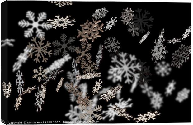 Stylish falling snowflakes pattern on black Canvas Print by Simon Bratt LRPS