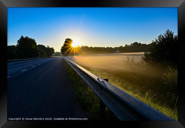 early sunrise over straight road with deminishing perspctive Framed Print by Jonas Rönnbro