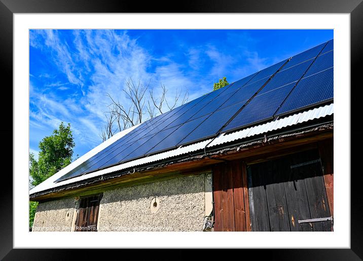 solar panels on the roof of a barn Framed Mounted Print by Jonas Rönnbro
