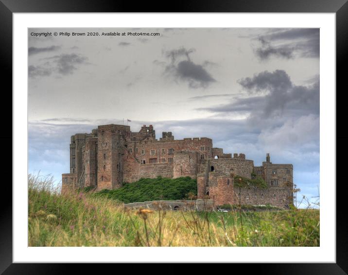 Bamburgh Castle in Northumberland Framed Mounted Print by Philip Brown