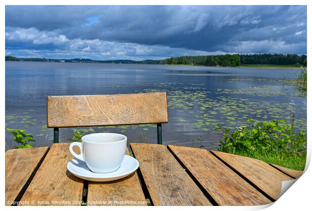 coffee cup on wooden table near lake Print by Jonas Rönnbro
