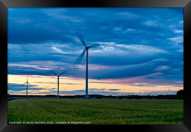 big windmills on field with dramatic sky Framed Print by Jonas Rönnbro