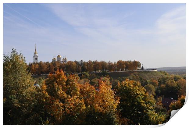 Stunning autumn landscape, top view, sun and blue sky, yellow trees, white Church, Golden domes, green grass, red leaves.  Print by Karina Osipova