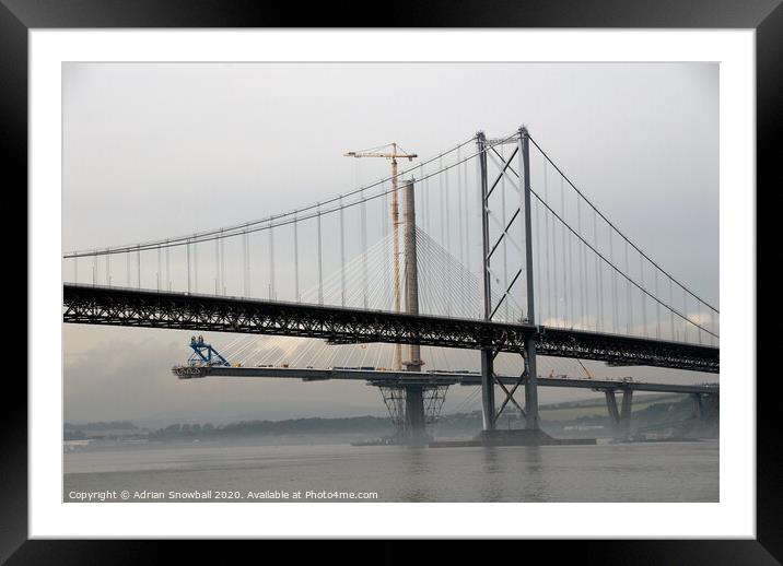 The Forth Road Bridge and the Queensferry Crossing unde construction Framed Mounted Print by Adrian Snowball