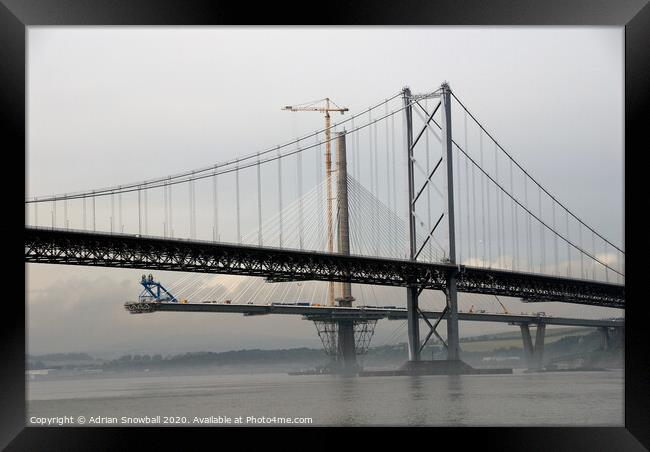 The Forth Road Bridge and the Queensferry Crossing unde construction Framed Print by Adrian Snowball