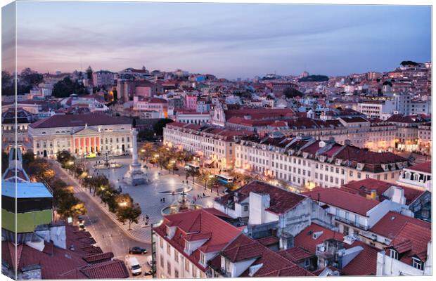 View Over Lisbon City At Dusk In Portugal Canvas Print by Artur Bogacki