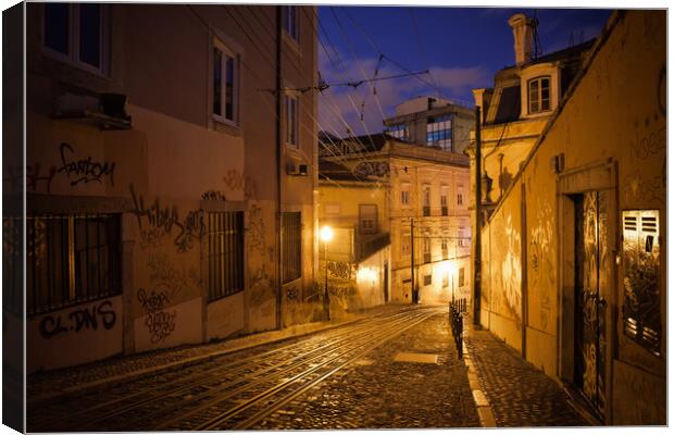 Calcada da Gloria Street at Night in Lisbon Canvas Print by Artur Bogacki