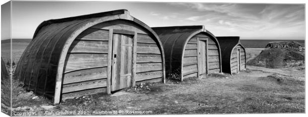 Upturned Boat Sheds on Holy Isle, Northumberland Canvas Print by Alan Crawford