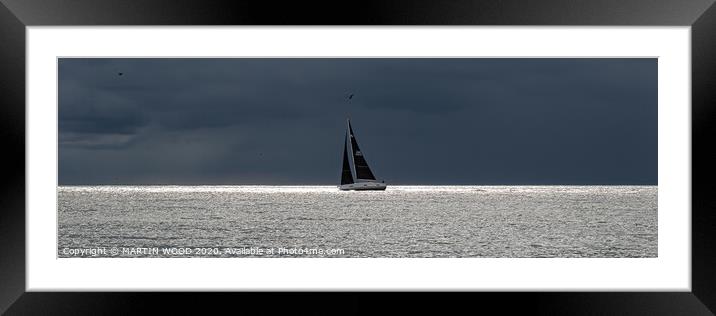Sailing past the storm. Folkestone.  Framed Mounted Print by MARTIN WOOD