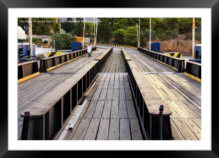 View of the submersible bridge over the Corinth Canal, on which the motorcycle rides, close-up. Framed Mounted Print by Sergii Petruk