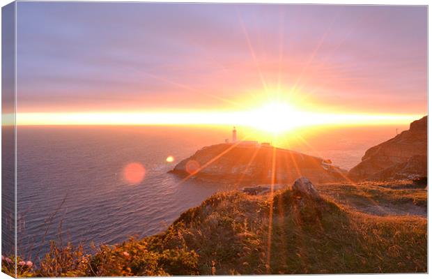 Sun Rays at South Stack Anglesey Canvas Print by Amy Knight