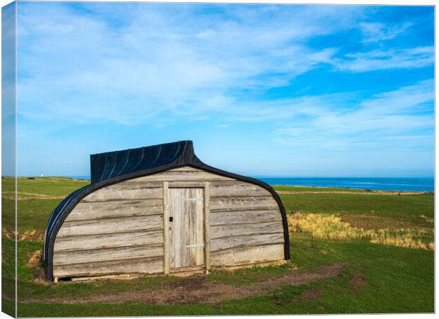 Lindisfarne Boat Shed. Canvas Print by Tommy Dickson