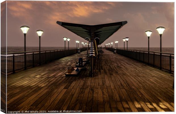 Boscombe Pier on a Stormy Evening Canvas Print by Phil Whyte