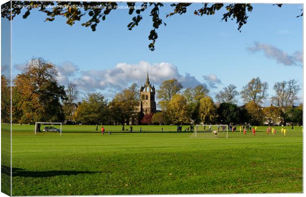 A football match takes place on the South Inch, Perth, Scotland Canvas Print by Navin Mistry