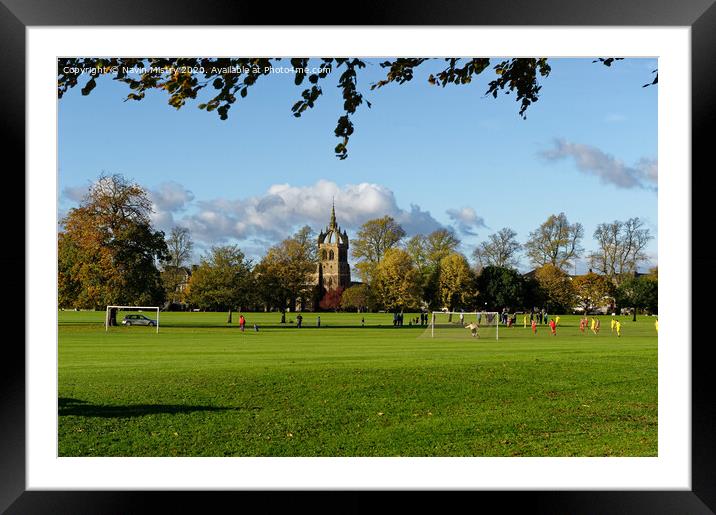 A football match takes place on the South Inch, Perth, Scotland Framed Mounted Print by Navin Mistry