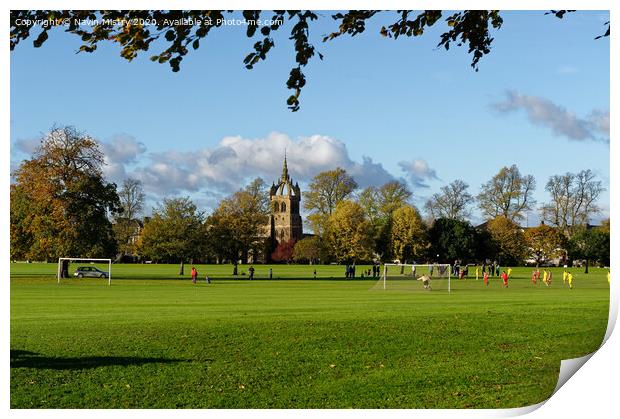 A football match takes place on the South Inch, Perth, Scotland Print by Navin Mistry