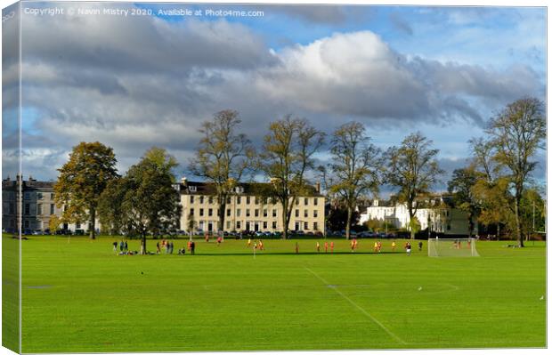 A football match on the North Inch, Perth, Scotland Canvas Print by Navin Mistry
