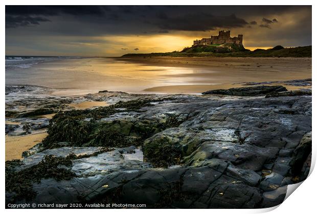 Majestic Bamburgh Castle overlooking the North Sea Print by richard sayer