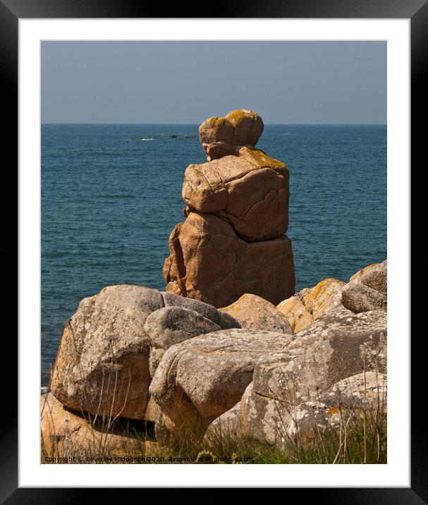 Granite couple looking out to sea on Brittanys pink granite coast, France Framed Mounted Print by Beverley Middleton