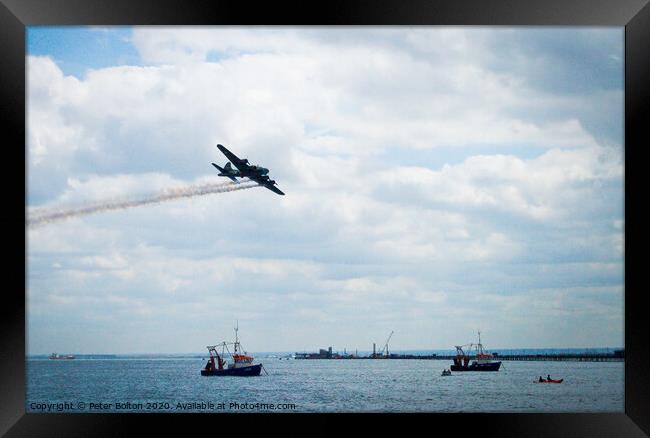 'Limping home'. aircraft at Southend Air Show reenacts damaged bomber returning home.. Framed Print by Peter Bolton
