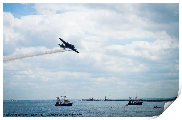 'Limping home'. aircraft at Southend Air Show reenacts damaged bomber returning home.. Print by Peter Bolton