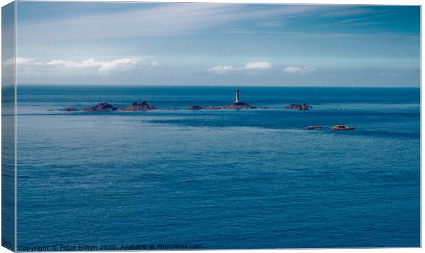 Longships Lighthouse at Lands End, Cornwall.  Canvas Print by Peter Bolton