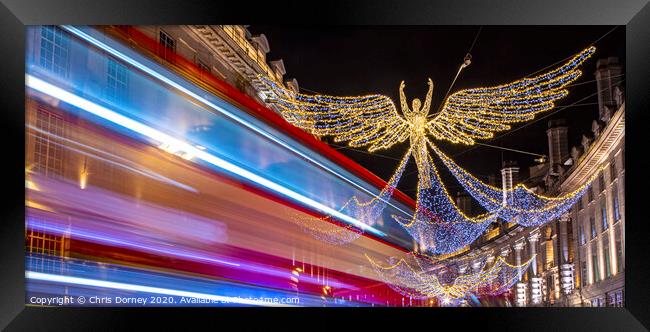 Regent Street Christmas Lights in London Framed Print by Chris Dorney