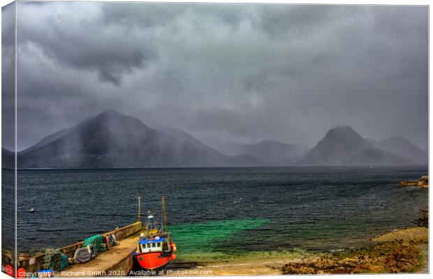 A shower of rain crosses the Black Cuillin Range viewed from Elgol pier. Canvas Print by Richard Smith
