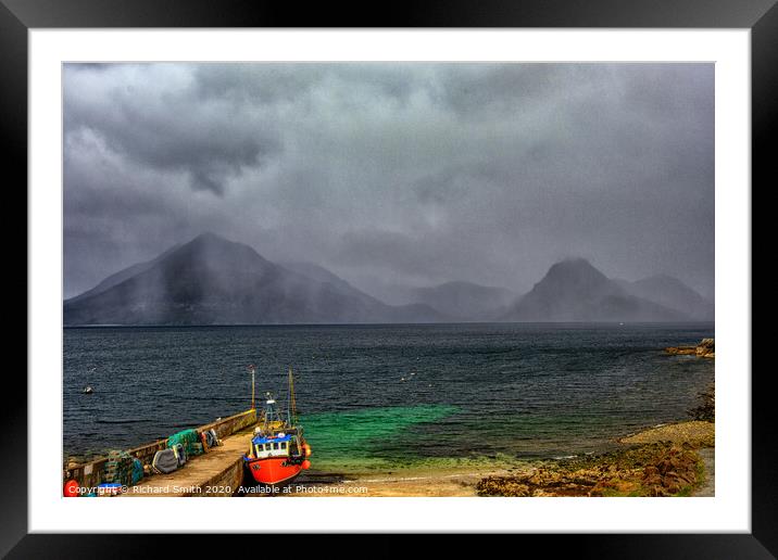 A shower of rain crosses the Black Cuillin Range viewed from Elgol pier. Framed Mounted Print by Richard Smith