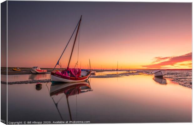 Rosy dawn at Brancaster Staithe. Canvas Print by Bill Allsopp