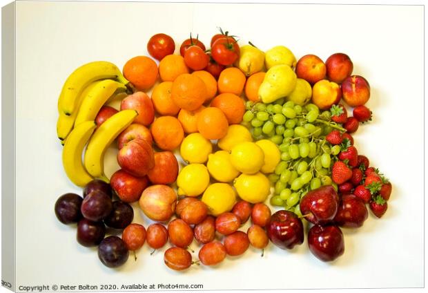 Still life of fresh fruits arranged as graphic design on a white background Canvas Print by Peter Bolton