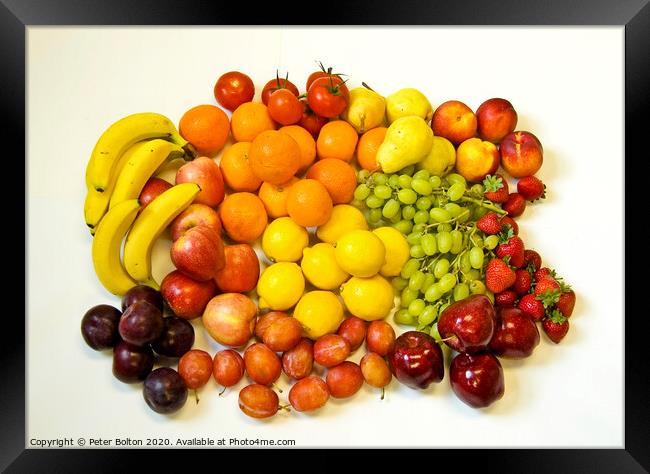 Still life of fresh fruits arranged as graphic design on a white background Framed Print by Peter Bolton