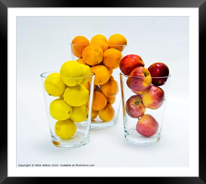 Graphic design of lemons, apples and oranges arranged in glass tumblers. Framed Mounted Print by Peter Bolton