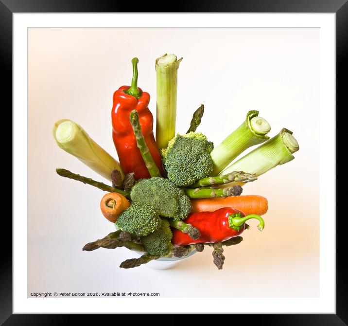 A variety of fresh vegetables arranged in a pot as a still life graphic design Framed Mounted Print by Peter Bolton