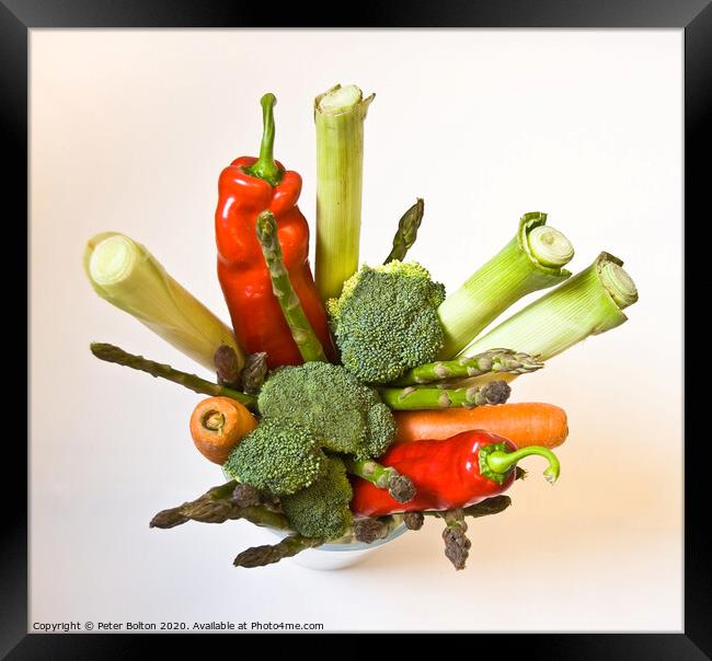 A variety of fresh vegetables arranged in a pot as a still life graphic design Framed Print by Peter Bolton