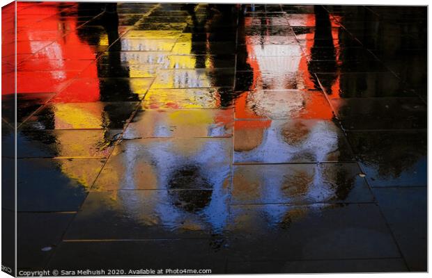 abstract reflections of shadows and neon light in wet pavement Canvas Print by Sara Melhuish