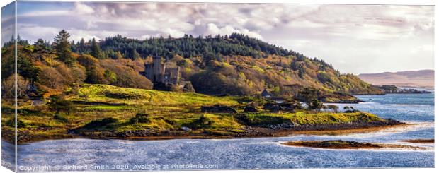 Dunvegan castle, Isle of Skye, nestled amongst the woodland autumn colours. Canvas Print by Richard Smith