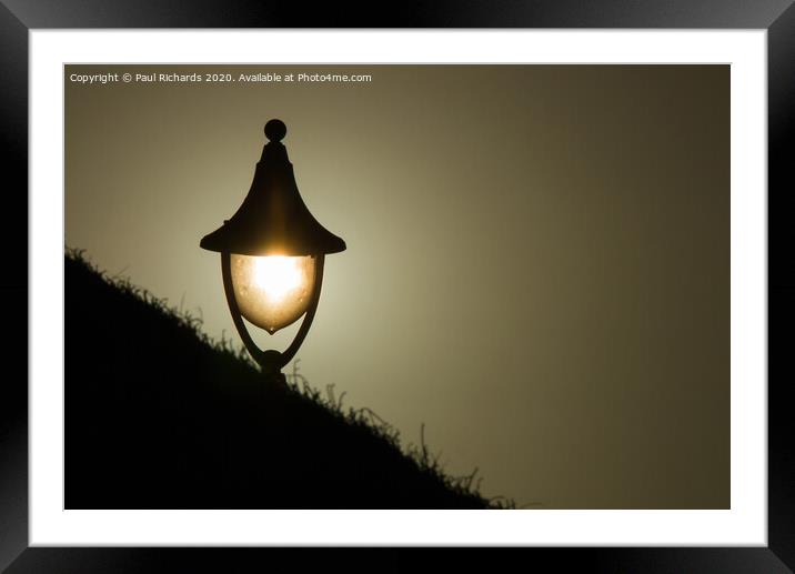 Lamplight at sunset Framed Mounted Print by Paul Richards