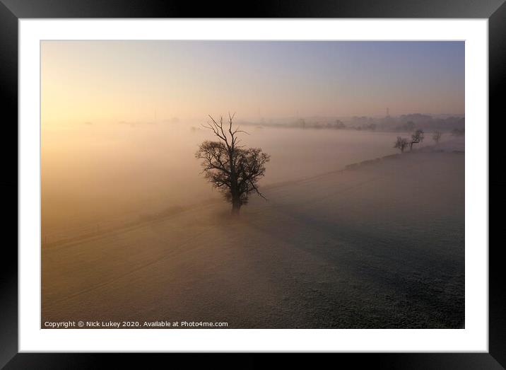 A sunrise over misty fields derbyshire Framed Mounted Print by Nick Lukey