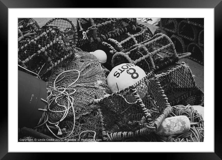 Fishing pots and nets Framed Mounted Print by Linda Cooke
