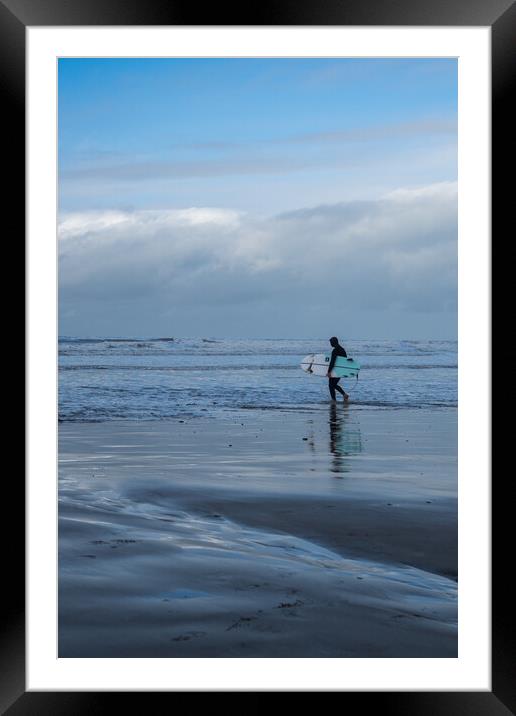 Surfer heading out to catch waves Framed Mounted Print by Tony Twyman