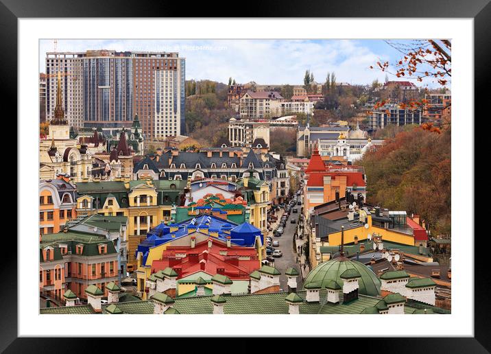 Landscape of an autumn city with a view of the restored roofs and buildings of Vozdvizhenka, the old district of Podil in the city of Kyiv. Framed Mounted Print by Sergii Petruk