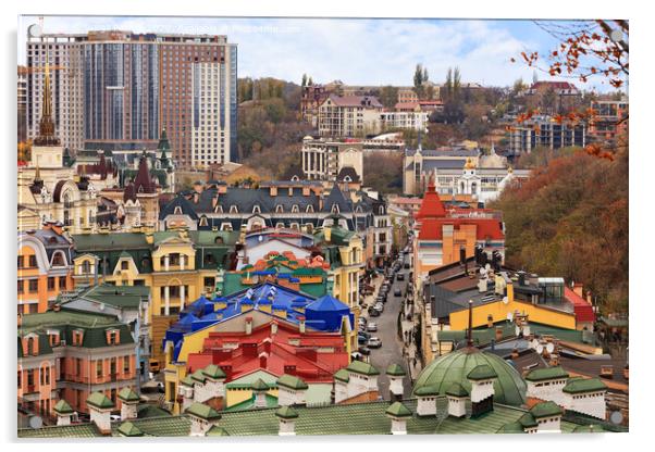 Landscape of an autumn city with a view of the restored roofs and buildings of Vozdvizhenka, the old district of Podil in the city of Kyiv. Acrylic by Sergii Petruk