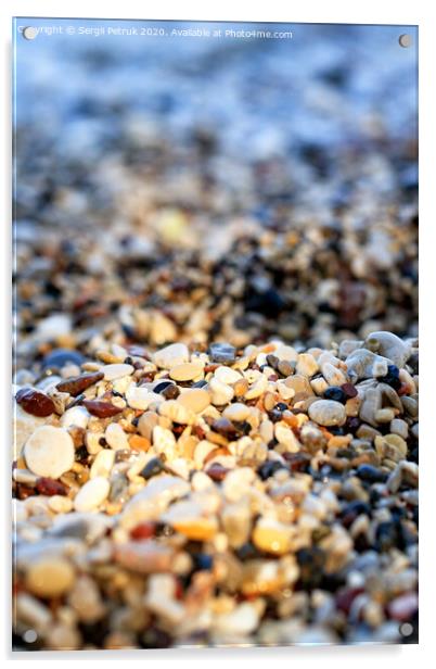 Beach pebbles backlit by a bright sunbeam. Acrylic by Sergii Petruk