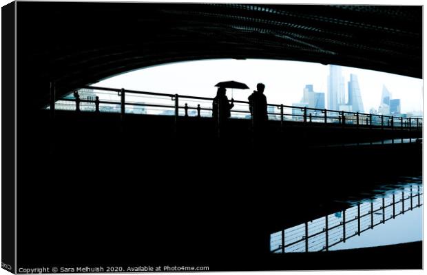 A stroll under the bridge Canvas Print by Sara Melhuish