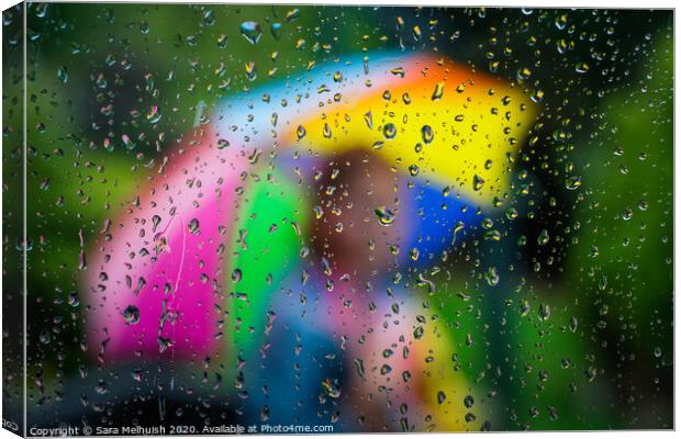 Rainbow umbrella Canvas Print by Sara Melhuish