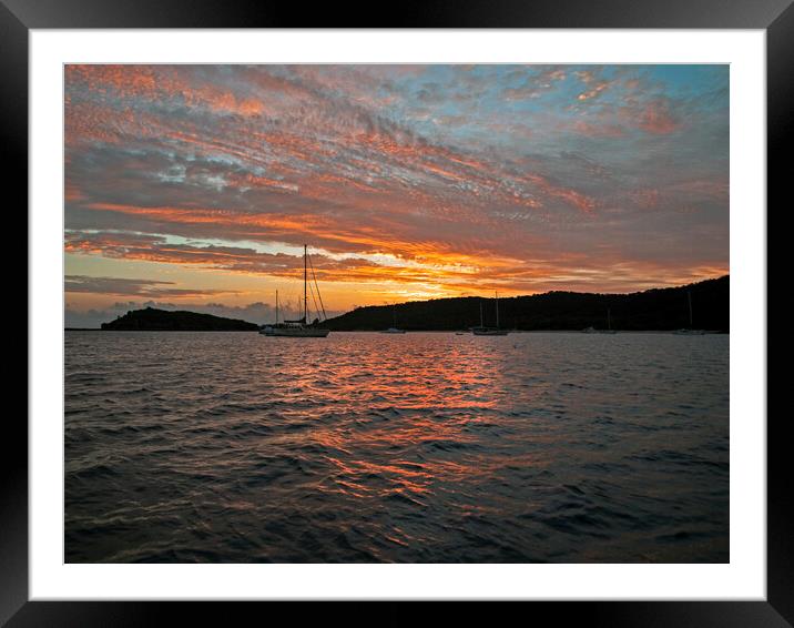 Orange stratocumulus cloudy island Sunrise. Framed Mounted Print by Geoff Childs